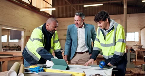 Architecture, team or supervisor in workshop with blueprint, building plan or Stock Footage 337986328