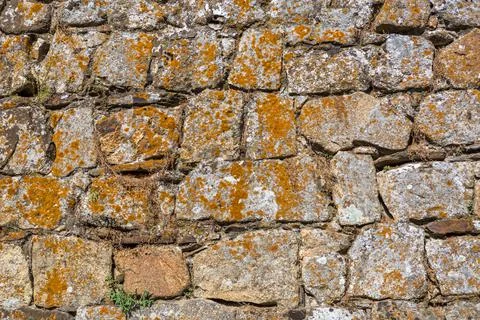 Architecture textures, detailed and rustic of paired masonry granite wall Stock Photos