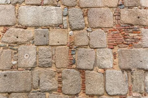 Architecture textures, detailed and rustic of irregular paired masonry granite Stock Photos