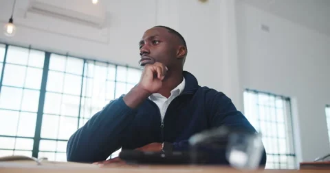 Architecture, thinking and black man in office for ideas, drawing and blueprint Stock Footage 341587902
