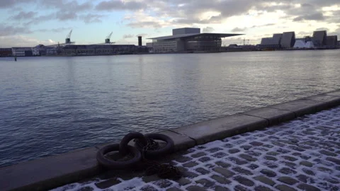 Architecture. View across the river to the opera house building. Stock Footage 306495661