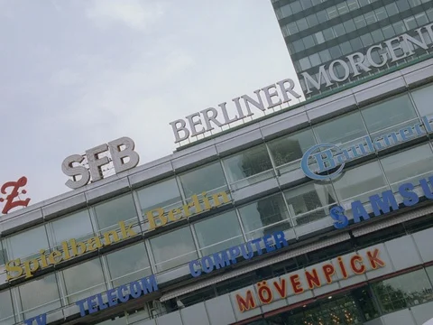 ARCHIVAL 35MM 2K- EXT. DAY BERLIN 1996 - BERLIN ALEXANDERPLATZ BUILDING W DE  Stock Footage 75377210