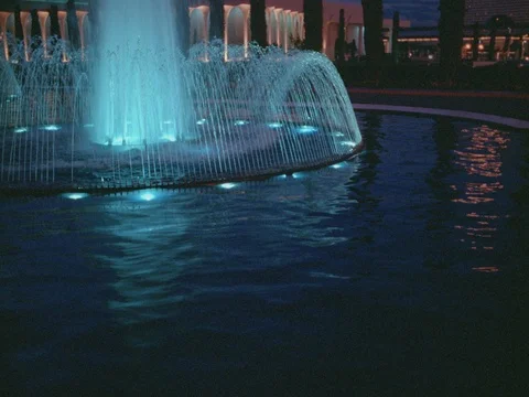 ARCHIVAL 35MM 2K EXT. DUSK- LAS VEGAS-CEASAR'S PALACE &amp; FOUNTAINS WIDE Stock Footage 75369632