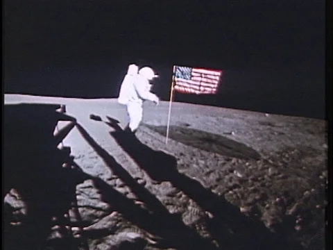 Archival footage of astronauts planting American flag on the moon Stock Footage