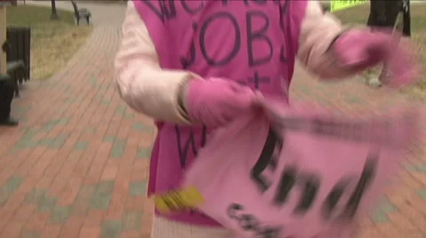 ARCHIVAL FOOTAGE: Code Pink protester Stock Footage 989472
