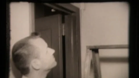 Archival Footage of Man Looking at Ceiling Hole at Bank Police Investigate Safe  Stock Footage 130237237