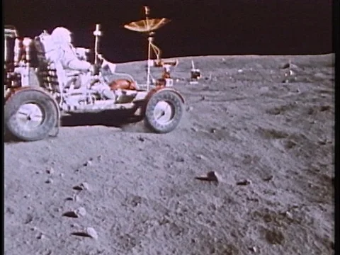 Archival footage of moon buggy on moon Stock Footage