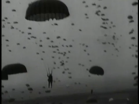 Archival footage of U.S. Paratroopers Invading Normandy on D-Day Stock Footage