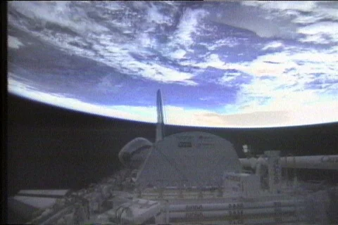 Archival Nasa - Shot of Earth from Space Shuttle with partial Shuttle in View Stock Footage 103443033