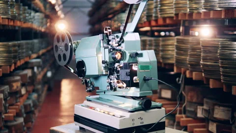 Archive facility with a functioning film projector Video stock 147237631