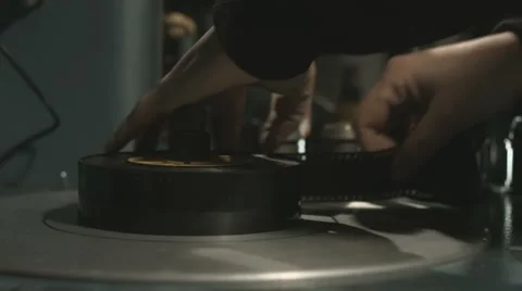 Archive film reel loading sequence in old film editing equipment Stock Footage 60649226