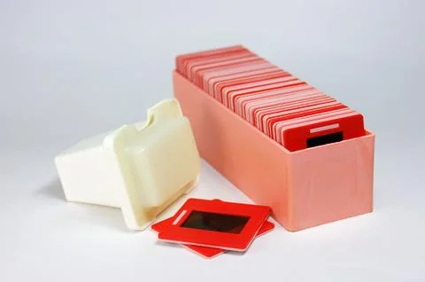 Archive of old slides in a box Stock Photos