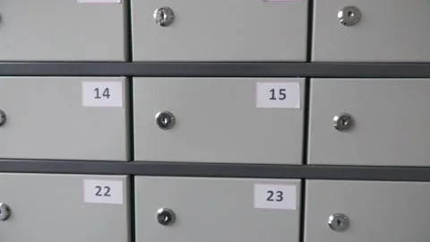 Archive storage file search .Mail boxes filled of leaflets and letters Stock Footage 220582564