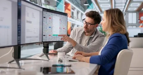 Archivist Systematically Managing Various Files On Computer For Cloud-Based O Foto stock