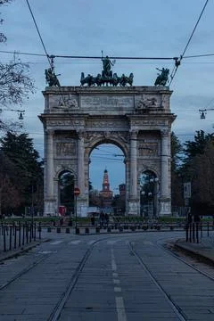 The Arco della Pace in Milan, in an afternoon with sun and clouds and a blue Stock Photos