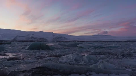 Arctic icebergs in glacial lake at Diamond Beach in Iceland Stock Footage