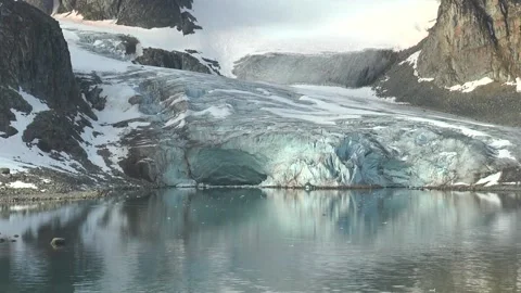 Arctic landscape. Mountains and Glaciers of the Svalbard archipelago. View from Stock Footage