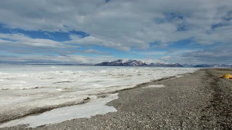 Arctic Landscape Over Ice Covered Water, Canada, Aerial Stock Footage 56654941