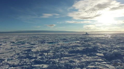 Arctic Landscape Over Ice Covered Blue Water Big Blue Sky Stock Footage 56655784