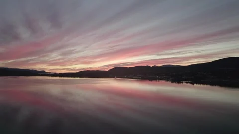 Arctic Norway Sunset With Red Clouds Reflecting on Water Stock-Footage 321648656