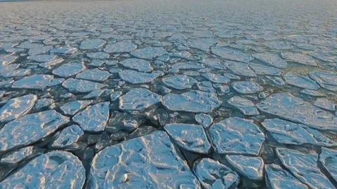Arctic ocean with broken ice floes floating Stock Footage 337038828