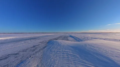 Arctic storm on the ice road. Arctic blizzard on the snow field. Snow drift.. Stock Footage 344766256