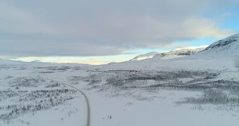 Arctic Train, C4k aerial, rising, drone shot, of a locomotive, on a polar rai Stock Footage 112265302