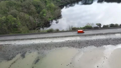 Ards Peninsula Coastal Road (Red Van) Stock Footage 273211001