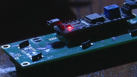 Arduino Microcontroller with Blinking Red, White and Green LED Lights. Stock Footage 326352628