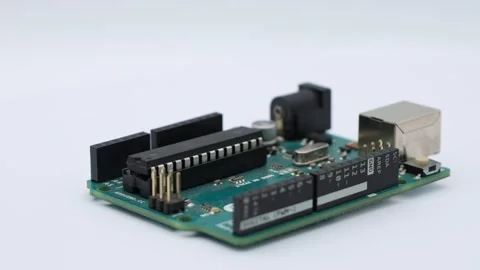Arduino Uno microcontroller board isolated on a white background, electronics Stock Footage 316213516