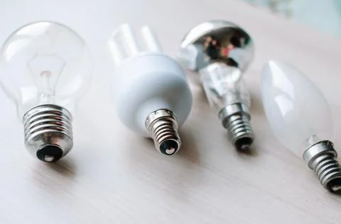 Are different types of light bulbs - incandescent, energy-saving and LED. Gro Stock Photos