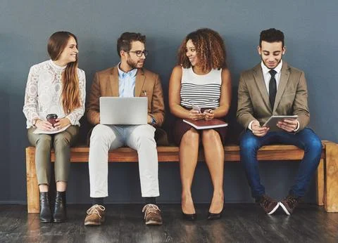 Are you ready for the interview. Studio shot of a group of businesspeople using Stock Photos