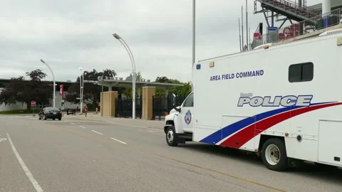 Area field command van of Toronto police driving in street, handheld view Stock Footage 162939080