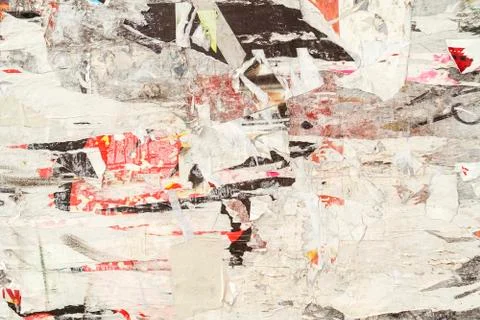 Area with torn down posters for backgrounds Stock Photos