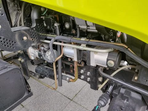 The area where the engine of a tractor is located. Details of a tractor Fotos de archivo