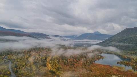 Areal drone hyperlapse, fly above clouds, Ural mountains, Russia Stock Footage 96526473