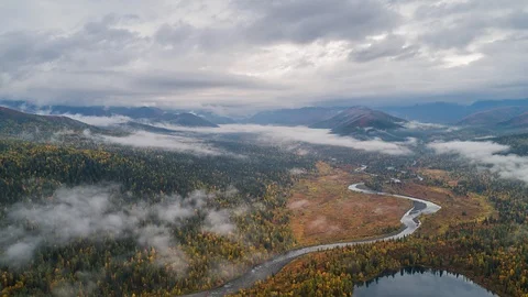 Areal drone hyperlapse, fly above clouds, Ural mountains, Russia Stock Footage 96526503