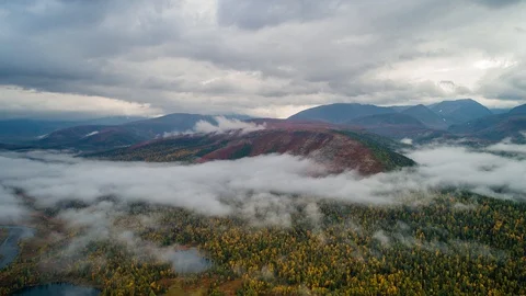 Areal drone hyperlapse, fly above clouds, Ural mountains, Russia Stock Footage 96526550
