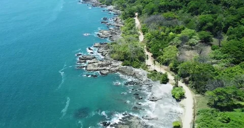 Areal drone view of Montezuma beach Nicoya Peninsula Costa Rica central America Stock Footage 282644531