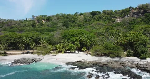 Areal drone view of Montezuma beach Nicoya Peninsula Costa Rica central America Stock Footage 282644545