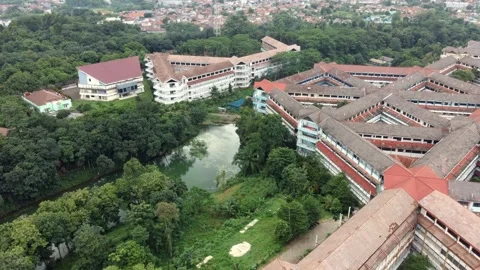 Areal IPB lake triangular building Stock Footage 296674325