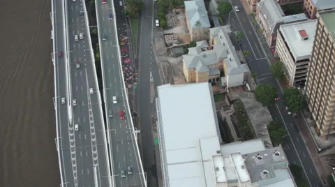 Areal shot of traffic on highways next to river in city Stock Footage 51797618