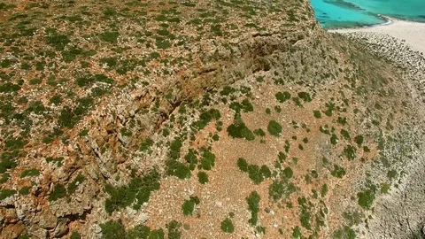 Areal view of mountain landscape with secluded beach Stock Footage 72656582