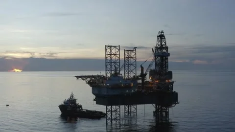 Areal view of offshore jack up rig and offshore platform Stock Footage 312477290