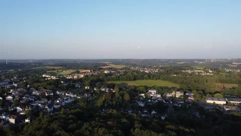 Areal view over a Town and Landing on a Soccerfield 스톡 동영상 201690145