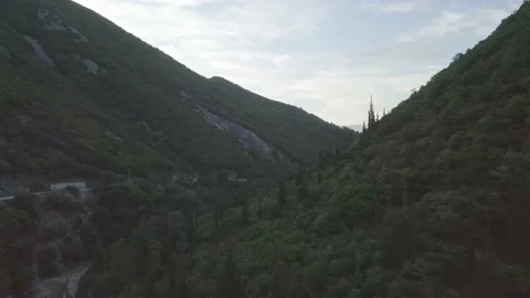 Areal View of a river between mountains of Balkan in Greece Stock Footage 131618592