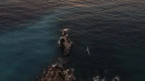 Areal View of Rocks in the Sea Stock Footage 210789767