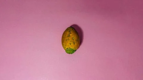 Areca nut on a pink background Stock Photos