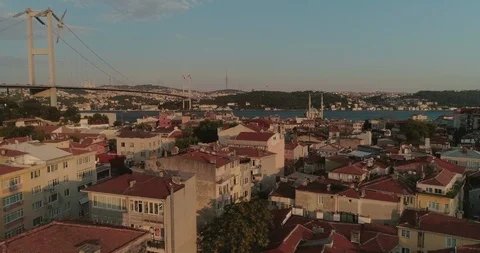 An areial view of the Bosphorus Bidge over Istanbul rooftops. Otrakoy. Istanbul. Stock Footage 93144483