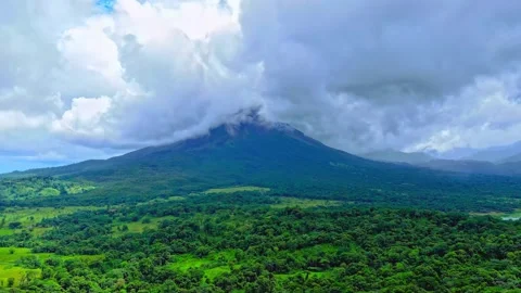 Arenal Volcano Beneath Rain Clouds and Tropical Rainforest Stock-Footage 341644933